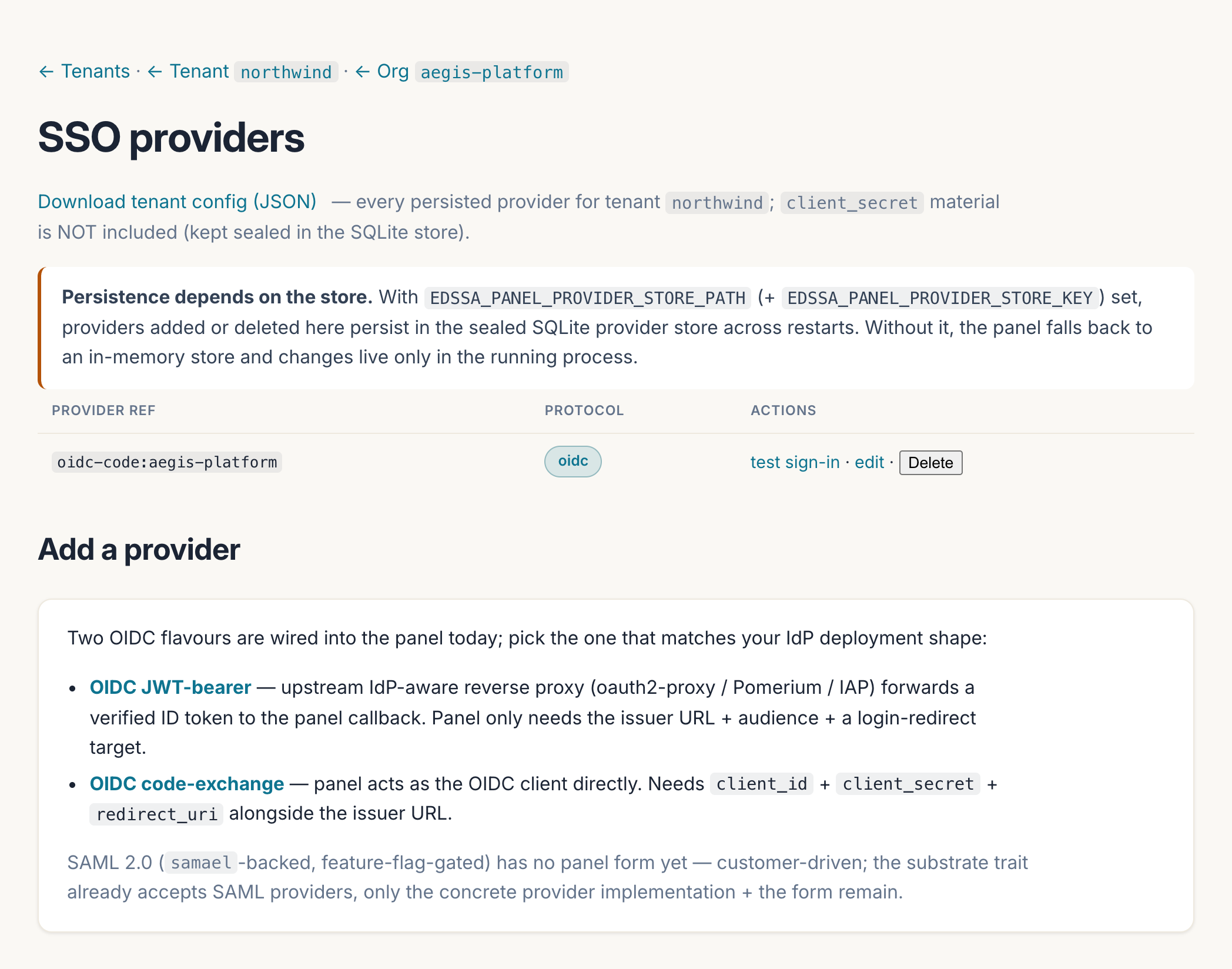 The panel's SSO providers page for the aegis-platform organisation: a breadcrumb from Tenants through the tenant to the org, a link to download the tenant's provider config as JSON that excludes client_secret material, a persistence note about the sealed SQLite provider store, and a provider table with one row — oidc-code:aegis-platform with an oidc protocol pill and test sign-in, edit and Delete actions — above an 'Add a provider' card describing the OIDC JWT-bearer and OIDC code-exchange flavours plus the pending SAML support.
